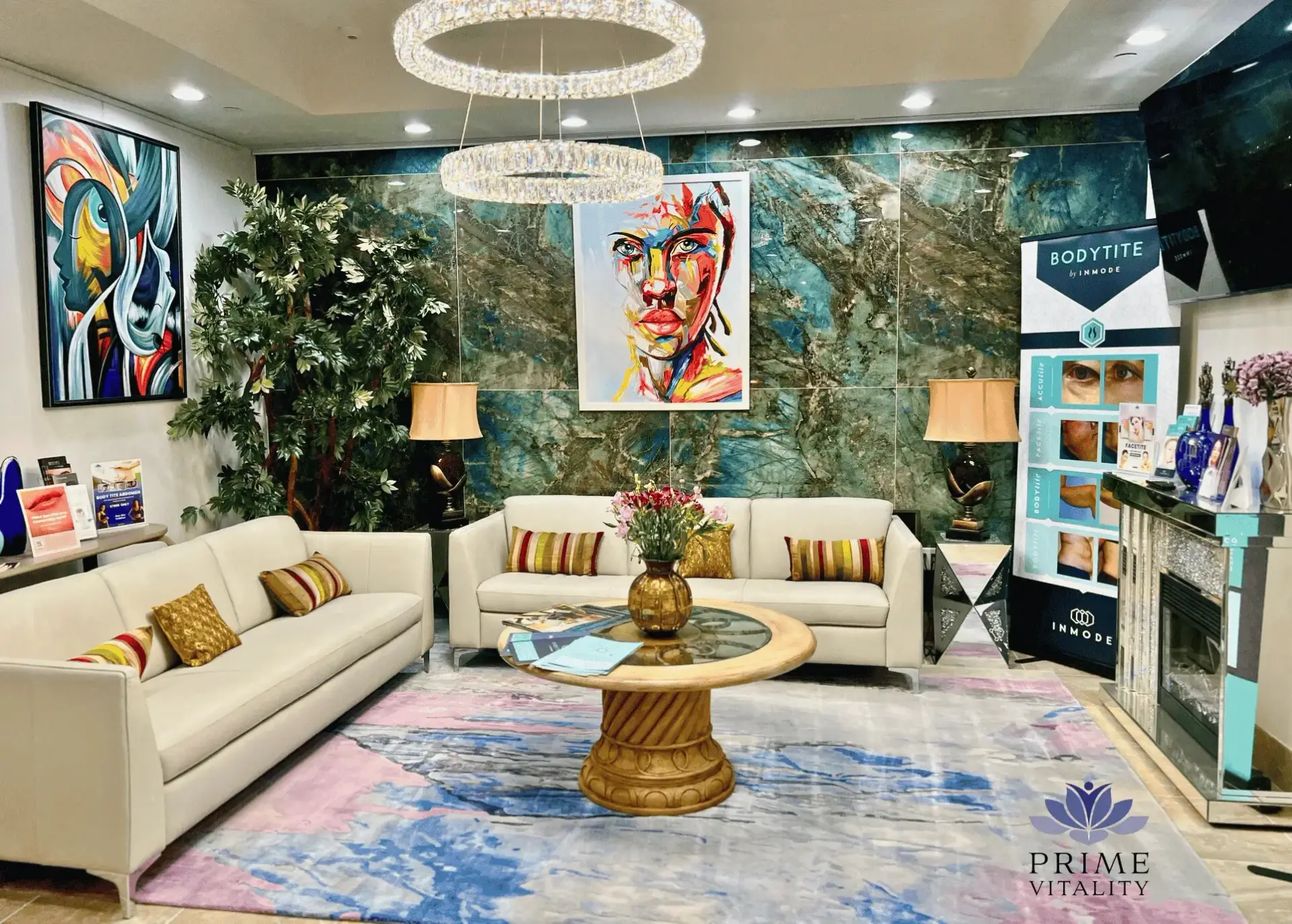 Modern wellness clinic waiting area with art, seating, and BodyTite signage.